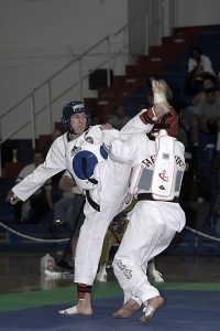 Taekwondo Terminology - Picture of two Taekwondo martial artists sparring